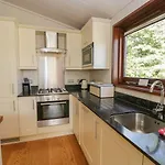 Leafy Nook Apartman *